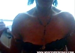 Non-pro granny MILF playing with her pierced nipples