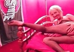 Blonde In Lingerie Vibrates Sex Toy On The Bed